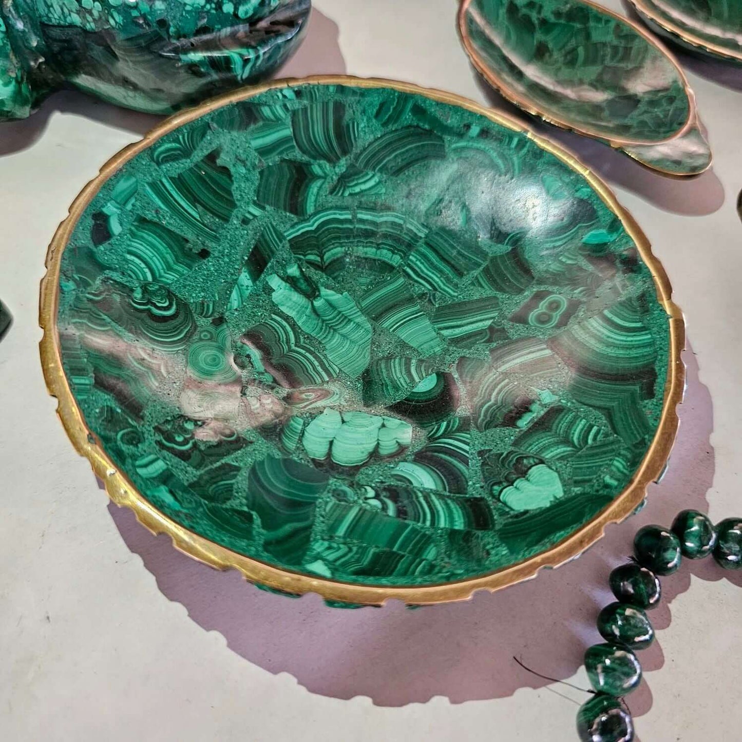 Image of a bowl made from malachite